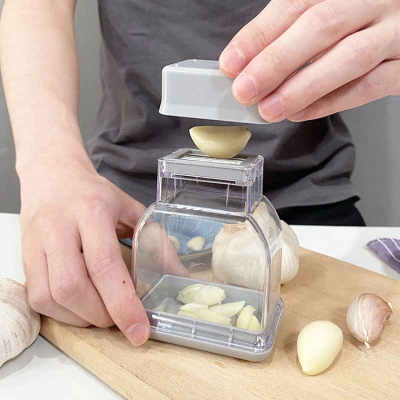 Homezo™ Press Garlic Cutter
